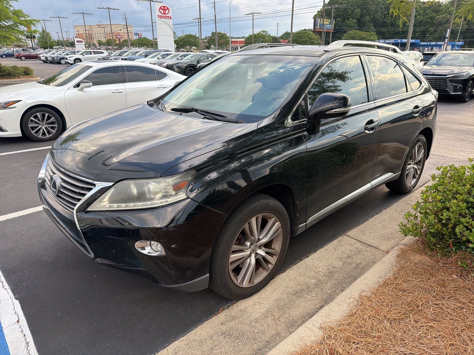 2015 Lexus RX 350 in Obsidian — front three-quarter view